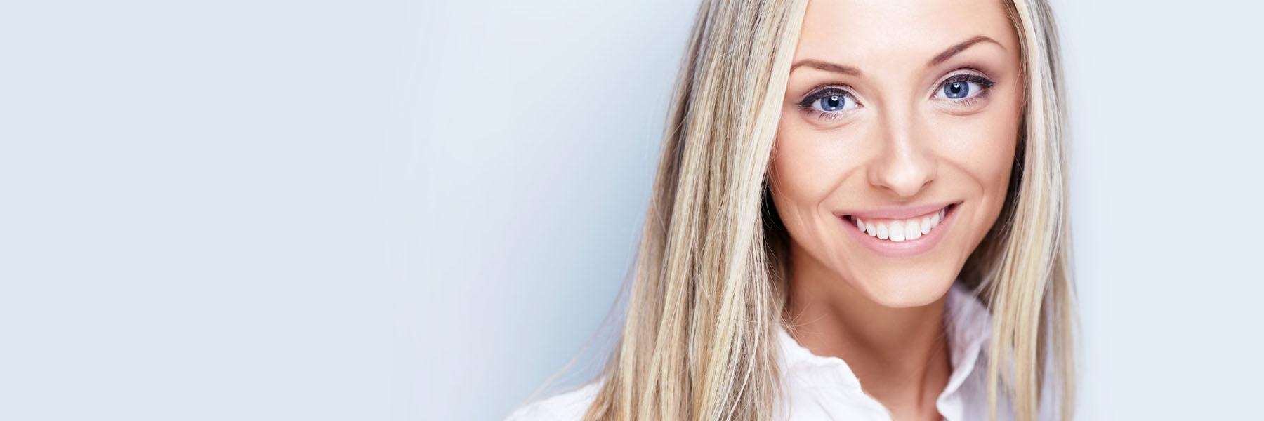 woman with blonde hair smiling