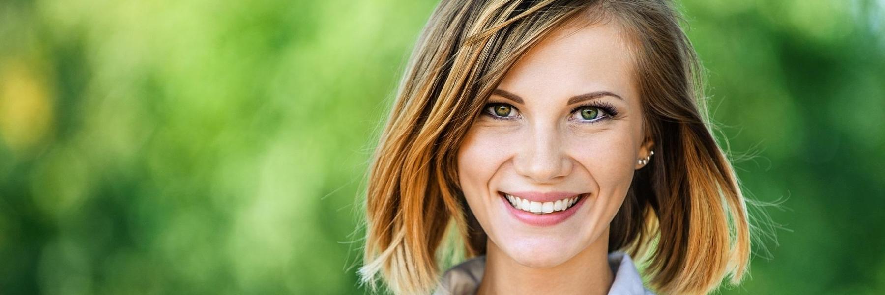 woman with dental bridge in eagan mn